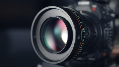 Image of camera lens (focus-ring on show)- Photo by ShareGrid on Unsplash