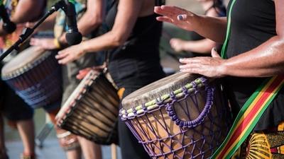Image of djembe drummers - Photo by Lee Pigott on Unsplash
