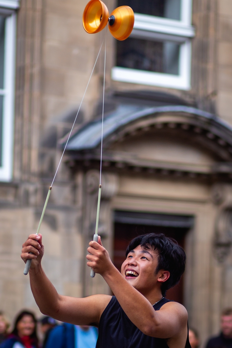 Cheng Yung Tsang grins as the diabolo spins above him