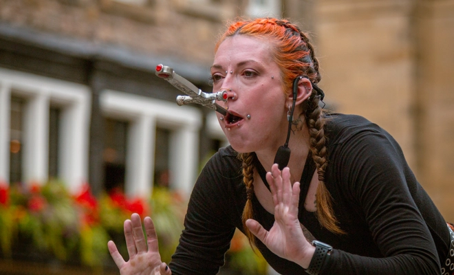 Let's do this slowly! The critical moment of a sword-swallowing act.
