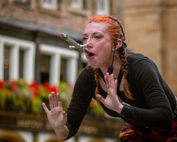 Let's do this slowly! The critical moment of a sword-swallowing act.